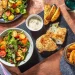 Cheesy Garlic Chicken Kievs with Rosemary Wedges, Baby Leaf and Tomato Salad Recipe
